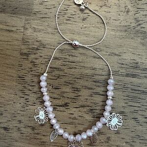 NWOT LC Lauren Conrad Silver Tone Openwork Floral Charm Adjustable Bracelet